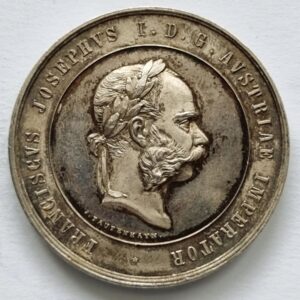 Stříbrná medaile- Státní cena za hospodářské zásluhy.